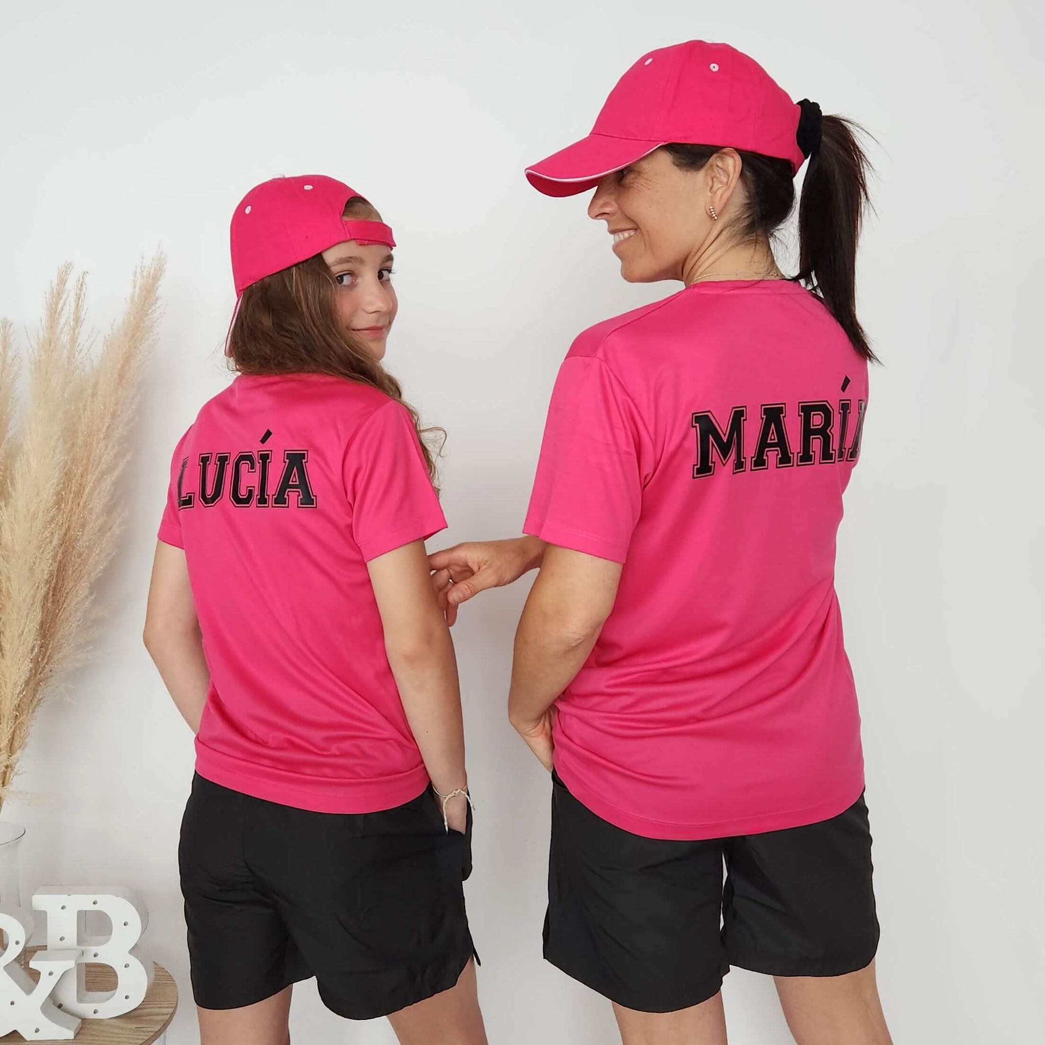 Camiseta técnica personalizable fucsia